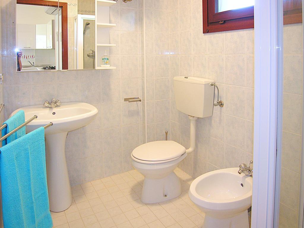Apartment Gemini Con Piscina Bibione Habitación foto
